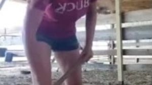 Farm girl gets horny in stall