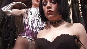 Redheaded mistress lesbian loves to restrain her slave girl