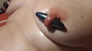 nippleringlover hubby inserting 17.5mm beads in extreme large gauge nipple piercings