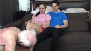 'The totally enslaved cuckold aged slave then has to lick the dirt off the shoes and shoe soles of both of them'