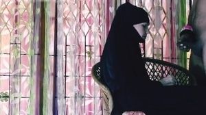 BUSTY MUSLIM HIJAB BABE SMOKING CIGARETTE